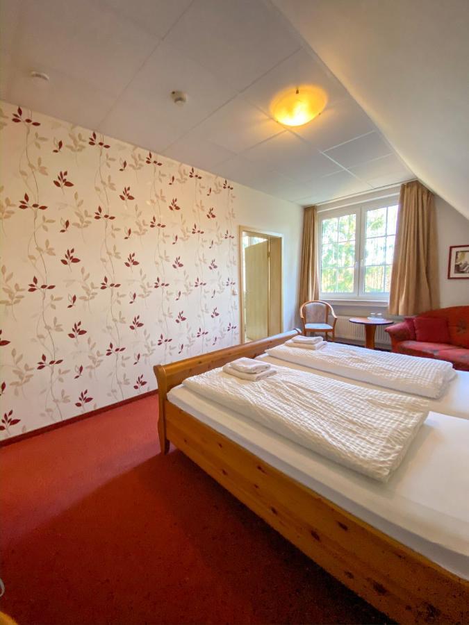 Hotel Sanssouci บาด ฟาลลิงบอสเทล ภายนอก รูปภาพ